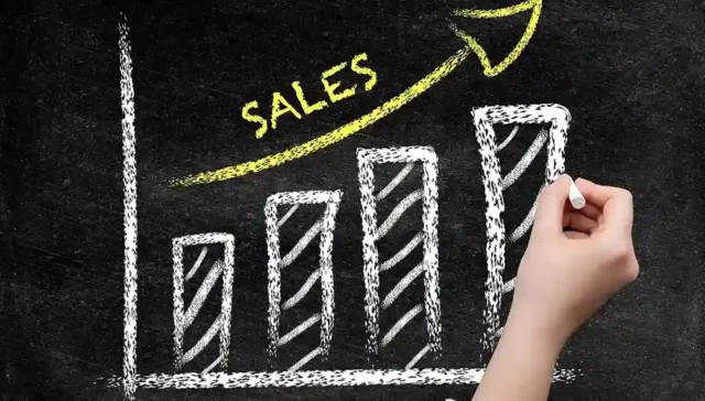 un grafico de ventas que apunta hacia arriba